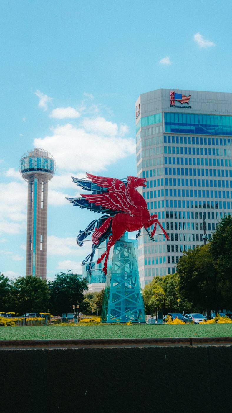 Pegasus sculpture and Reunion Tower in downtown Dallas