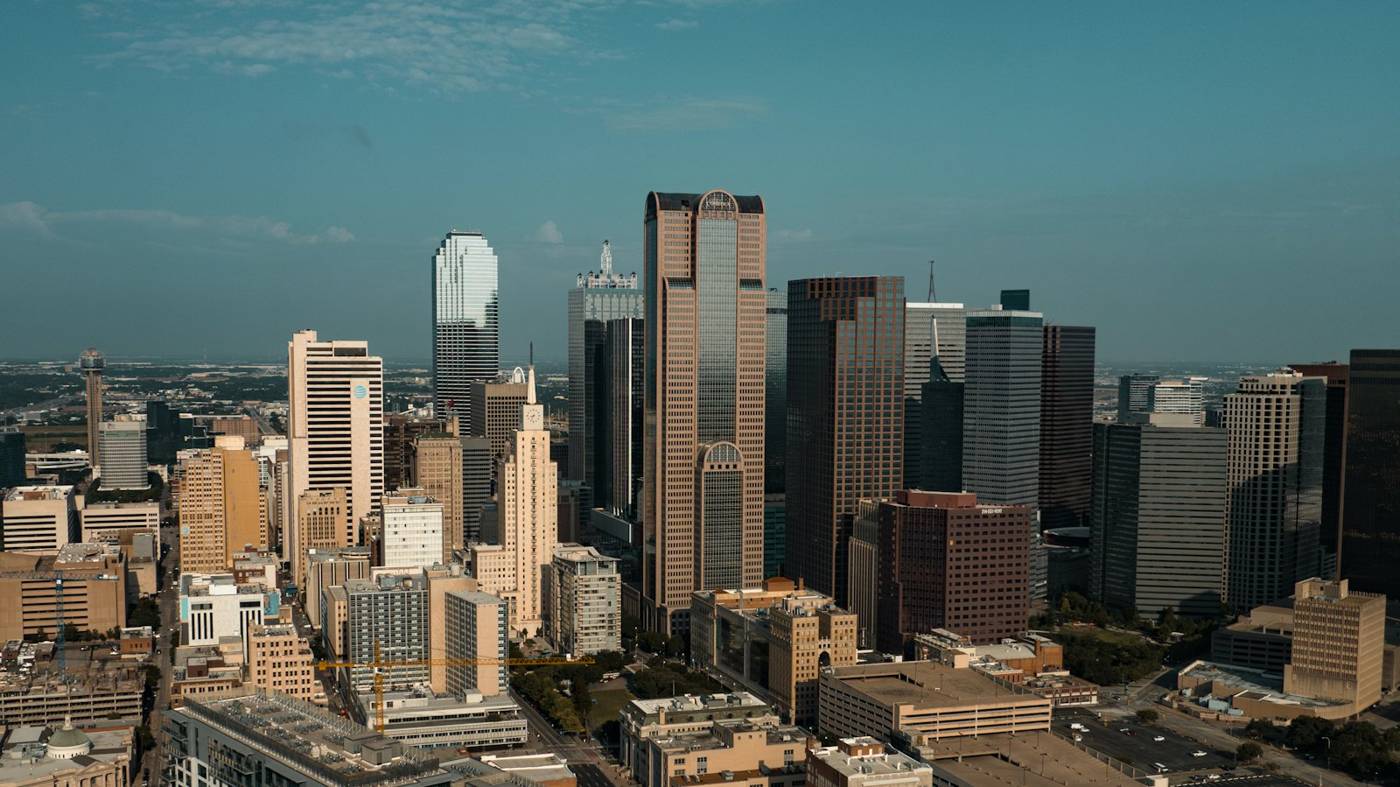 Dallas skyline over the treetops